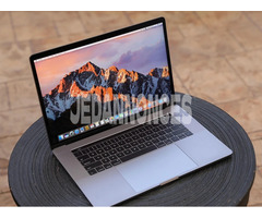 macbook pro touchbar 15 pouces Core i7 +possibilité facilite