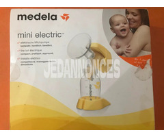 un tire-lait électrique de la marque  medela, en bon état.