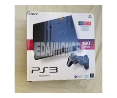 PS3 160Gb + 2 Manettes + 9 Cd neuf imp de l'usa