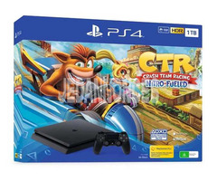 Ps4 slim édition limitée Crash nitro racing 1 To + 2 manettes + 2 jeux