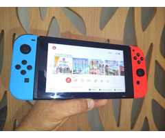 nintendo switch + carte SD 128GB