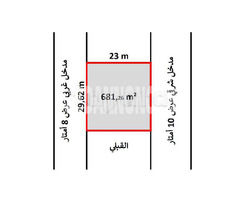 أرض بطريق العين كلم 12